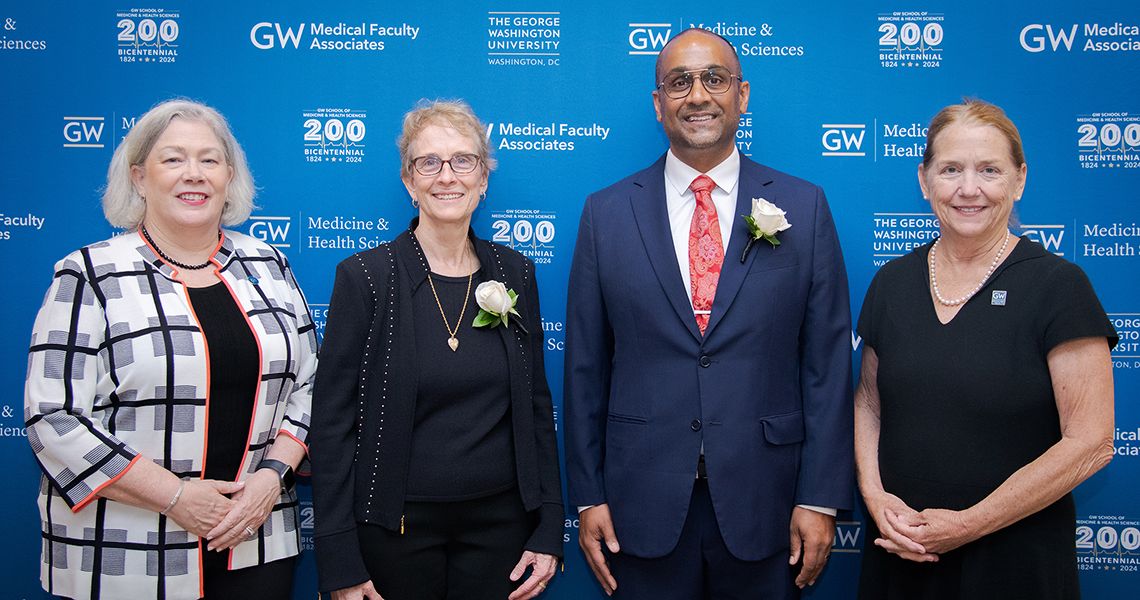 from left, President Granberg, Puchalski, Goyal, Dean Bass