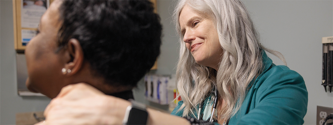 Julie Bauman with a patient