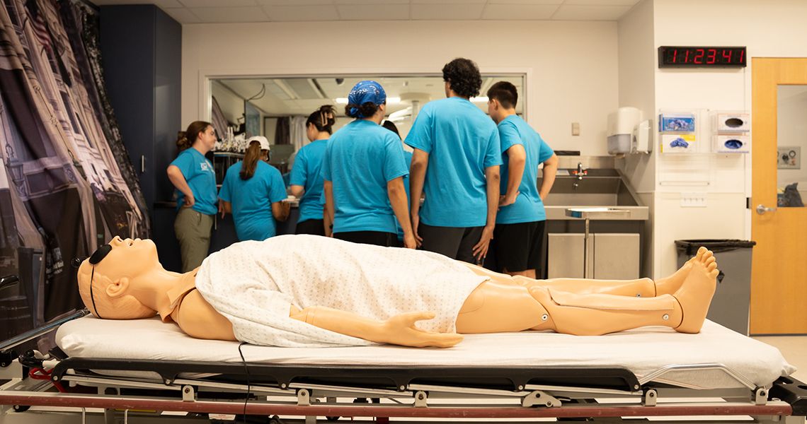 Students explore the sim lab in the Class Center