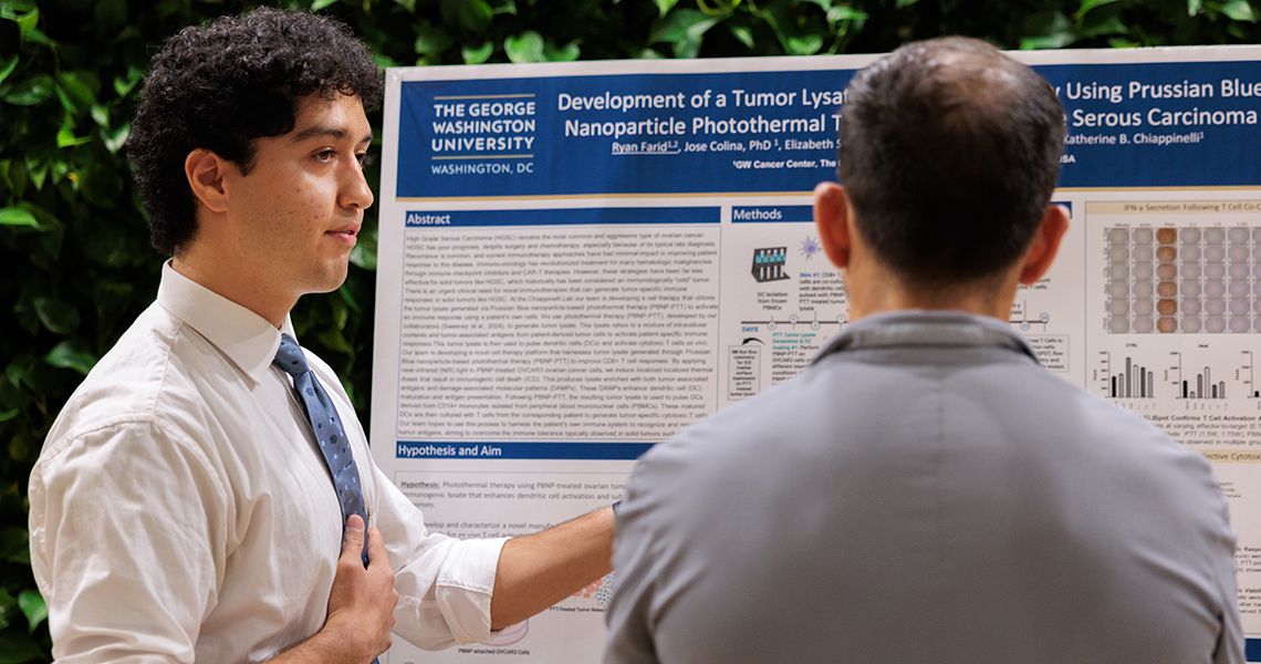 Student presenting research at SPARC Poster Session