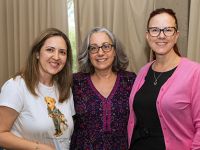 BLS student with department chair Marcia Firmani, PhD, MSPH (center)