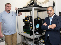 Greg Cresswell (left) with Sanjay Maggiwar (right) with the current flow cytometer