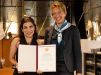 Zareen Zaidi, on left with Karolinska Institutet representative