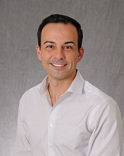 Dr. Alberto Bosque posing for a portrait