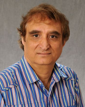 Dr. Imtiaz Khan posing for a portrait