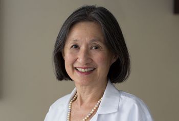 Dr. May Chin posing for a portrait