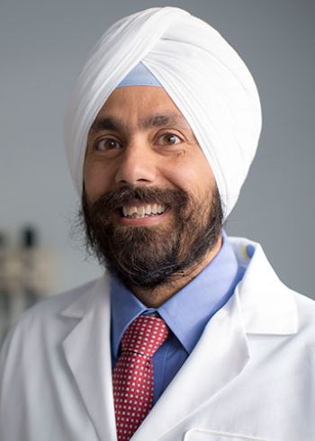 Dr. Ameet Singh posing for a portrait