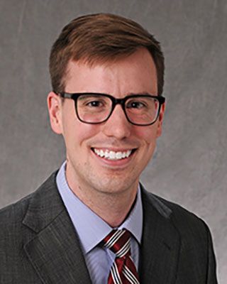 Steven Langerman posing for a portrait