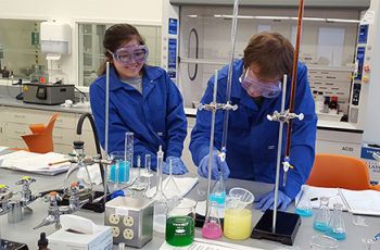 Two students working in a laboratory