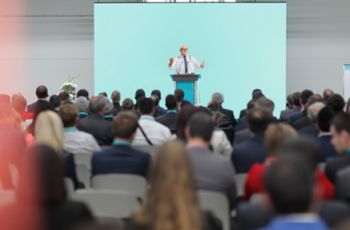 Doctor speaking at a Grand Rounds Lecture