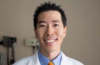 Dr. Andrew Choi posing for a portrait