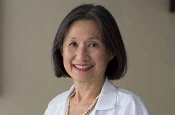Dr. May Chin posing for a portrait