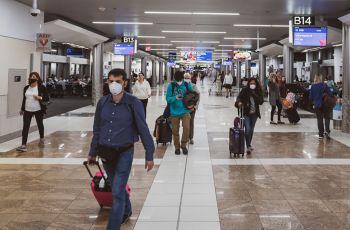 Passengers walking in an airport terminal