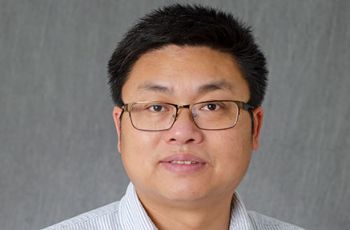 Dr. Huadong Pei posing for a portrait
