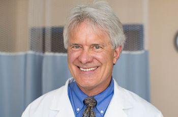 Dr. John Rothrock posing for a portrait