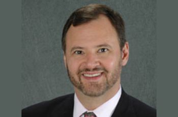 Dr. Alan Greenberg posing for a portrait