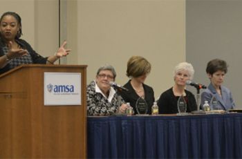 Katherine Chretien, Carolyn Clancy, Laura Tosi, and others at a panel table and podium