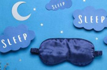 A sleep eye mask surrounded by clouds labeled 'Sleep'