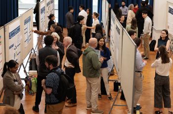 Students present their research during poster session