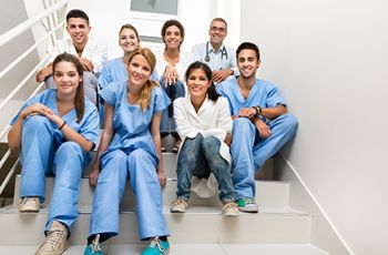 A cohort of medical students sitting together