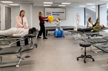 GW Occupational Therapy practitioners working with patients