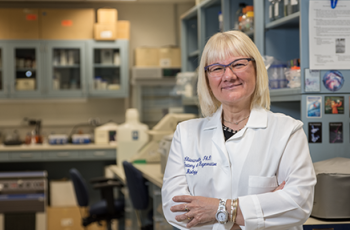 Anne Chiaramello, PhD, in lab.