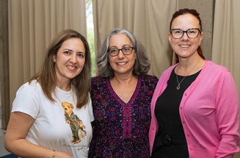 BLS student with department chair Marcia Firmani, PhD, MSPH (center)
