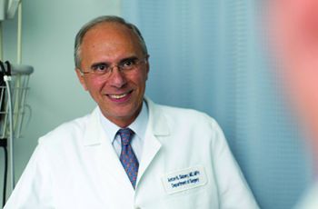 Anton Sidawy in white coat 