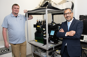 Greg Cresswell (left) with Sanjay Maggiwar (right) with the current flow cytometer
