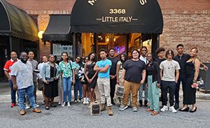 Upward Bound Program students standing in front of Maggiano's restaurant